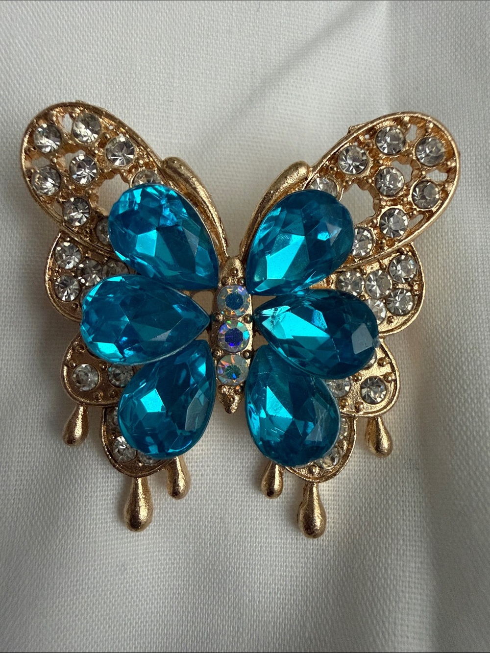 Gold-tone Butterfly Brooch with Blue Crystal Wings